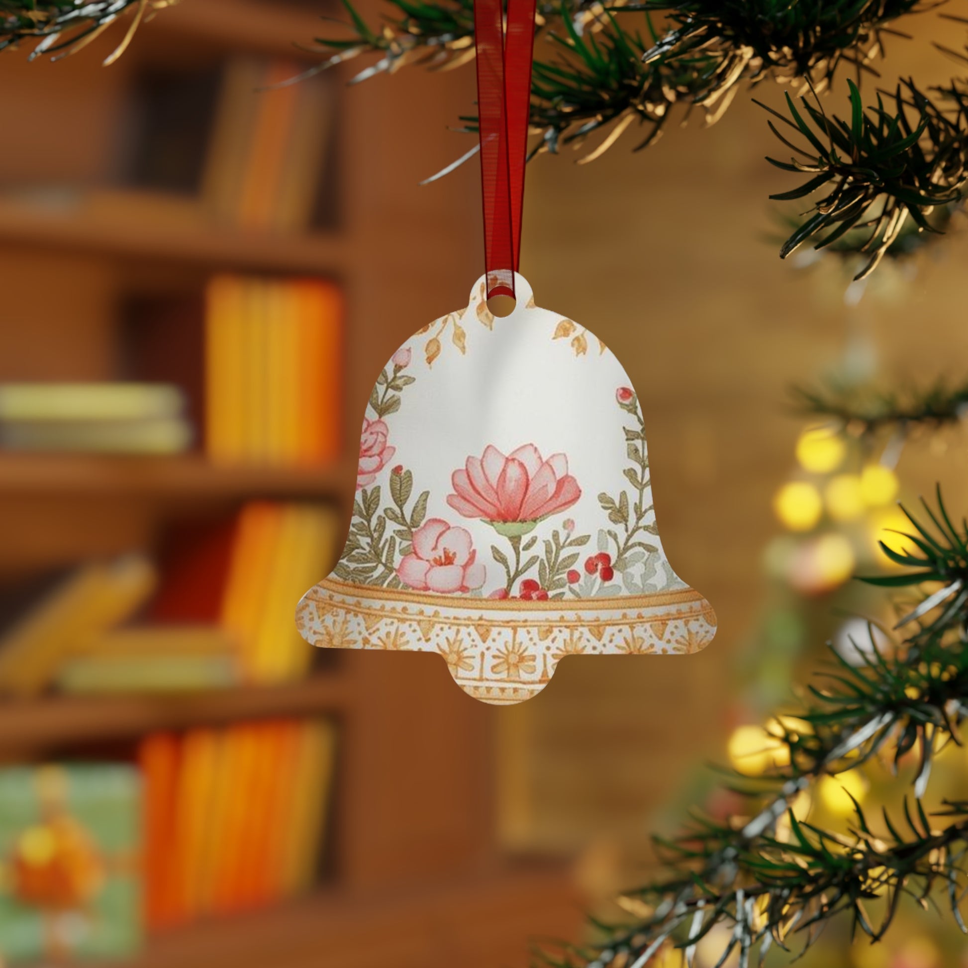 Elegant floral Christmas bell ornament hanging on a festive Christmas tree branch