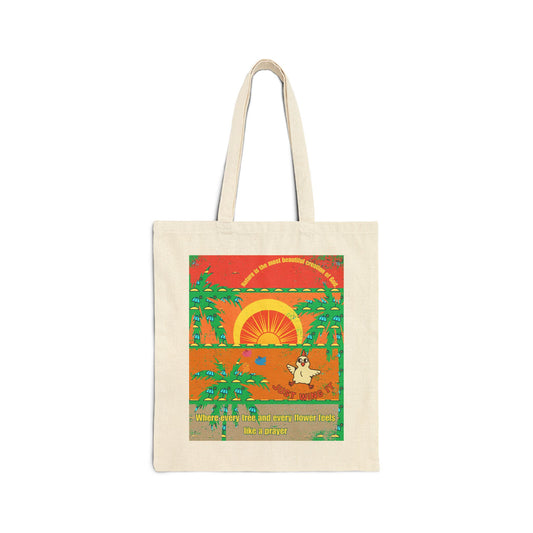 A cotton canvas tote bag with a printed design featuring a sunset, trees, and a character.