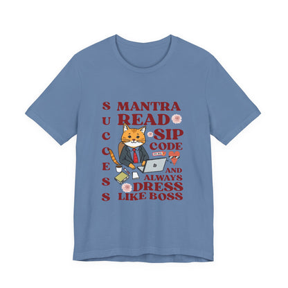 Blue t-shirt with a graphic of a cat in a suit and text on a white background

