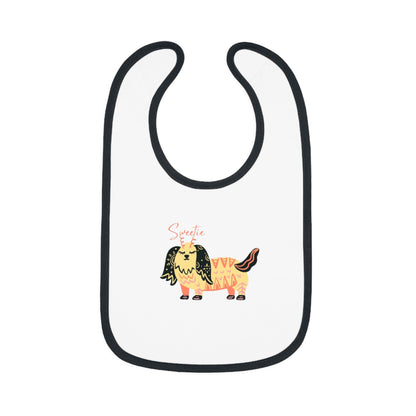 white sweetie bib with cute dog print designed for comfort and functionality