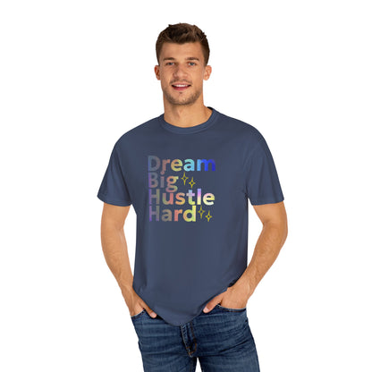 Man wearing a navy blue t-shirt with colorful text on a white background