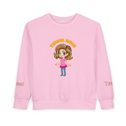 Pink sweatshirt with cartoon character and 'TinSEL' text on a white background
