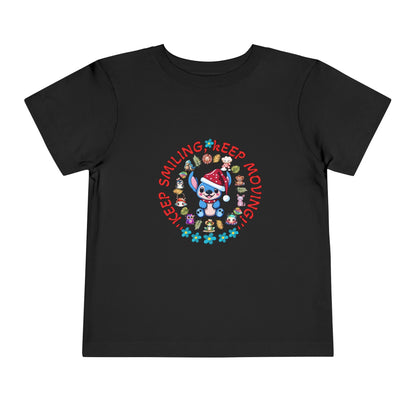 Toddler t-shirt with a cute dog illustration and motivational quote "Keep Smiling Keep Moving" printed in the center.